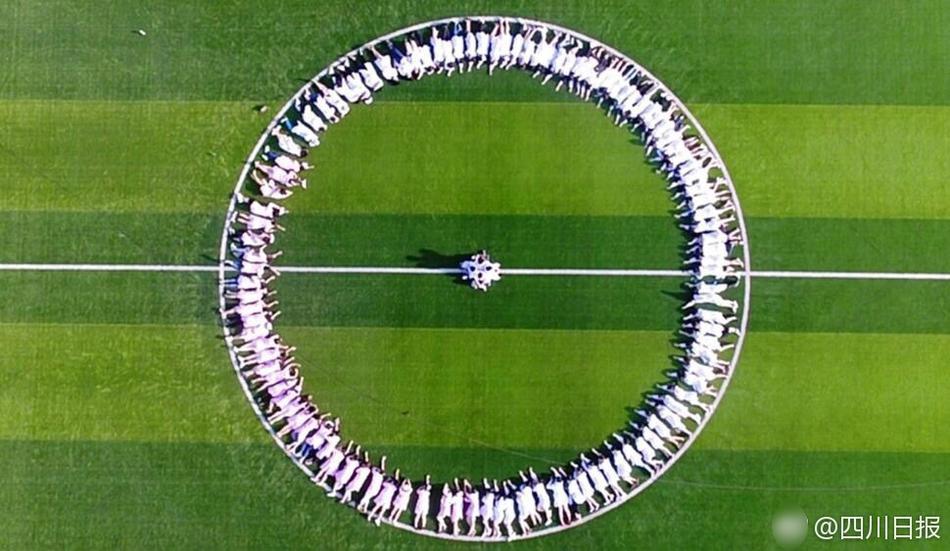 Male nursing school students hold signs to highlight gender in graduation photos 