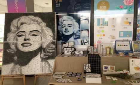 Marilyn Monroe portrait using only nails and string
