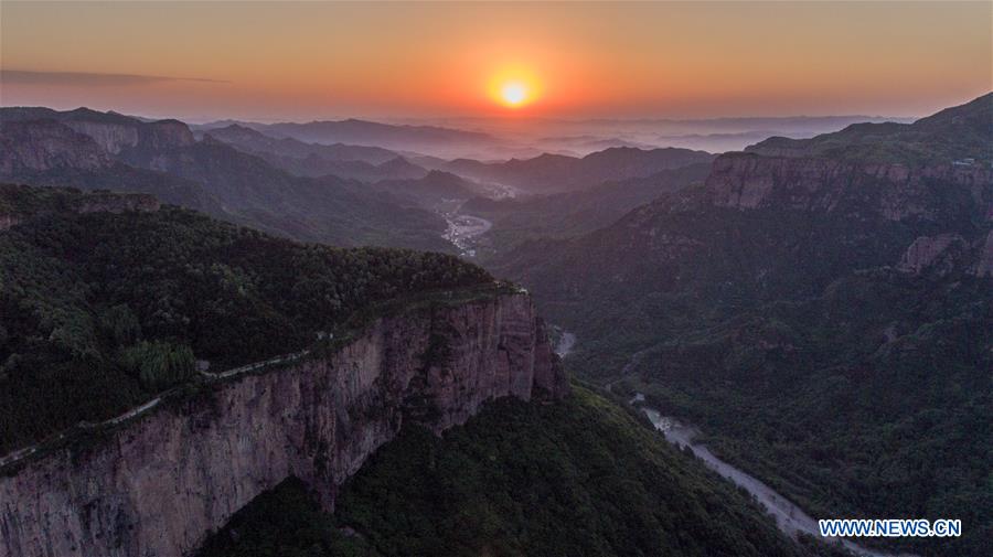 Villagers in China's Henan cast off poverty thanks to Guoliang cliff corridor