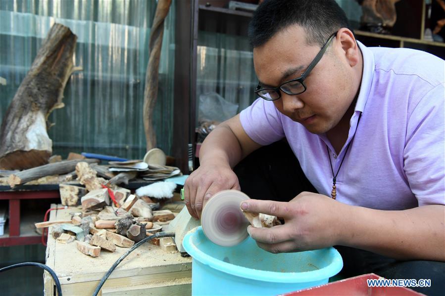 Villagers in China's Henan cast off poverty thanks to Guoliang cliff corridor