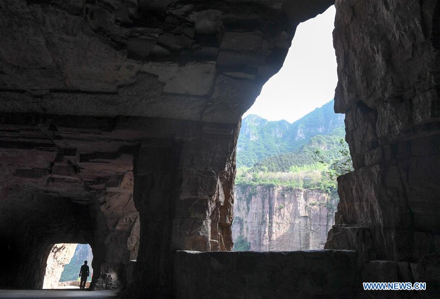 Villagers in China's Henan cast off poverty thanks to Guoliang cliff corridor