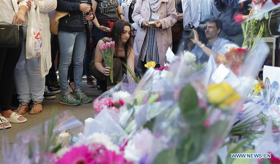 People mourn victims of Manchester terror attack