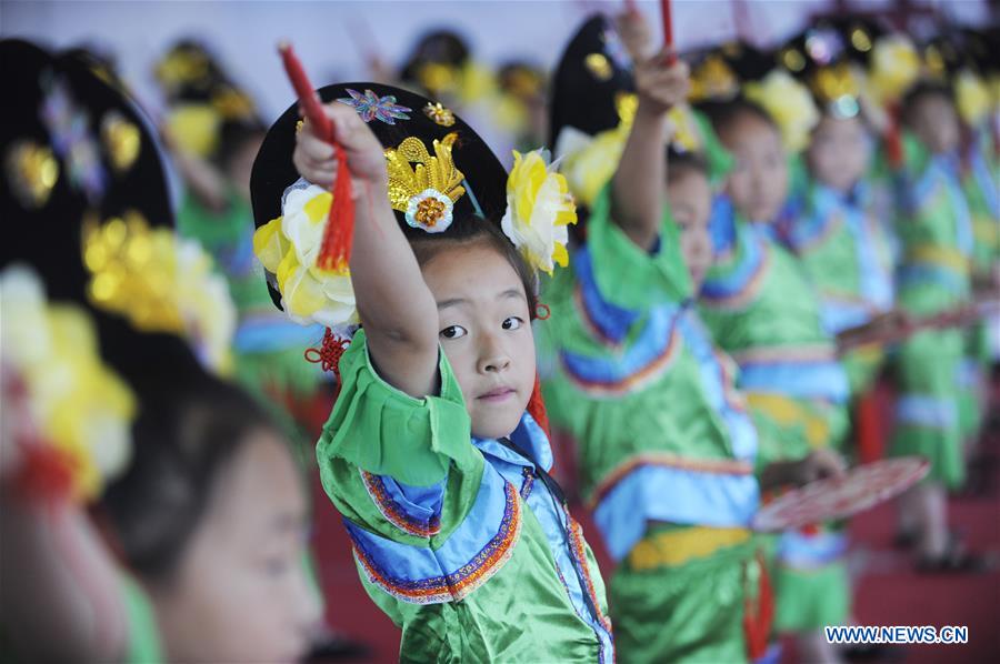 Pupils receive traditional culture education in N China's Hebei