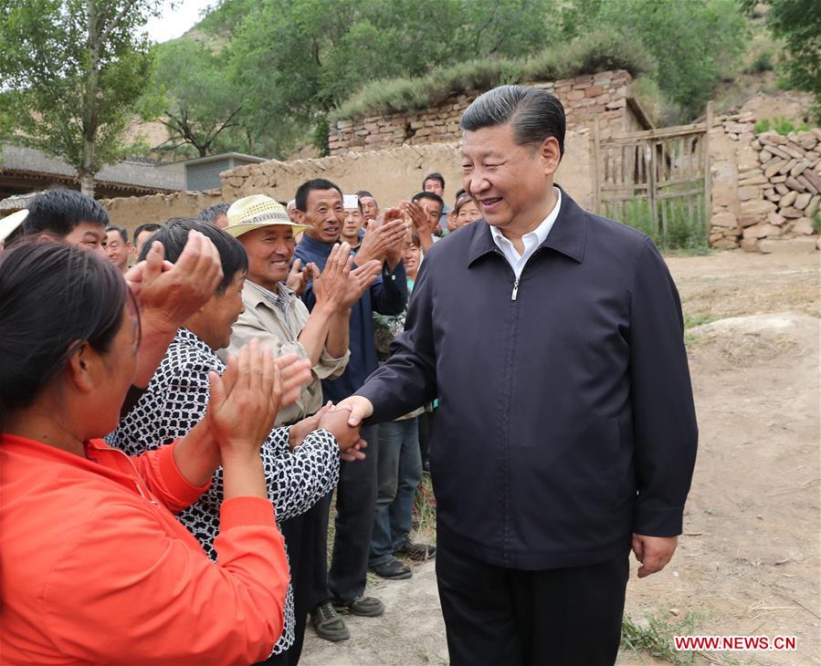 Xi calls for more ways to help poor