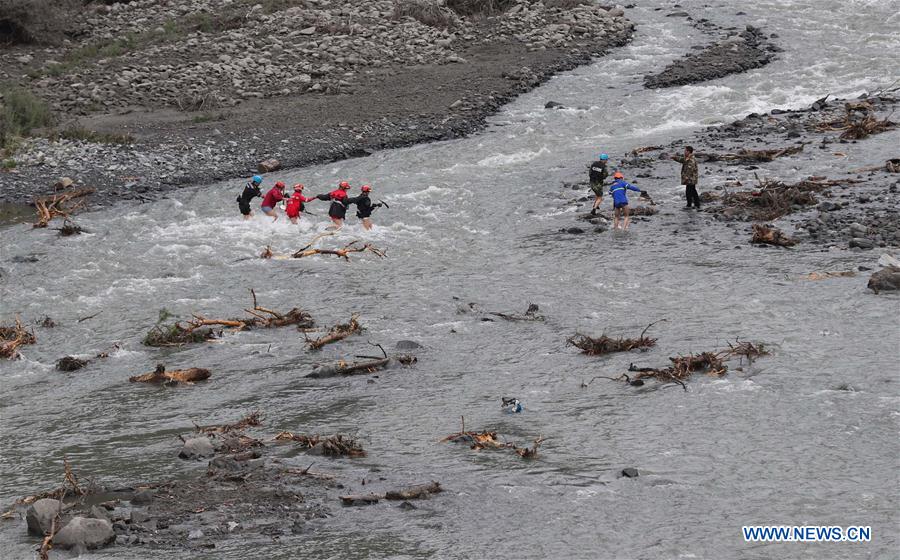 15 taken off missing list in China landslide