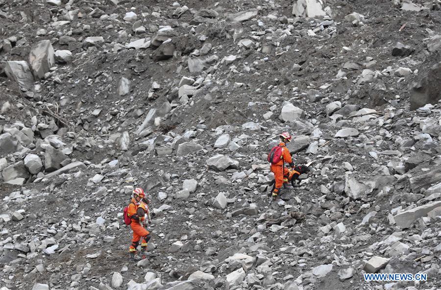 15 taken off missing list in China landslide