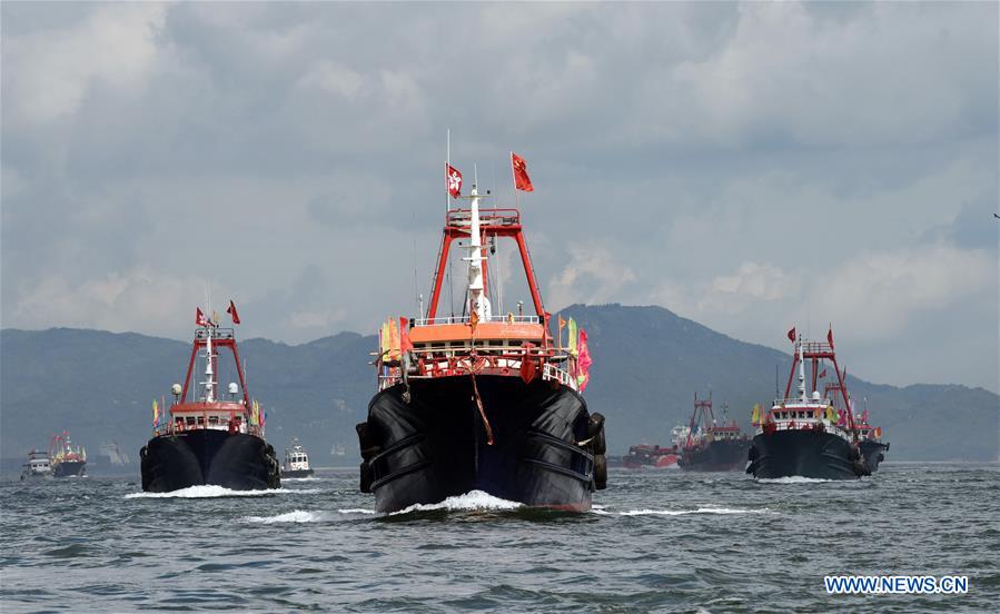 Fishing boats parade held to celebrate 20th anniv. of HK's return to motherland