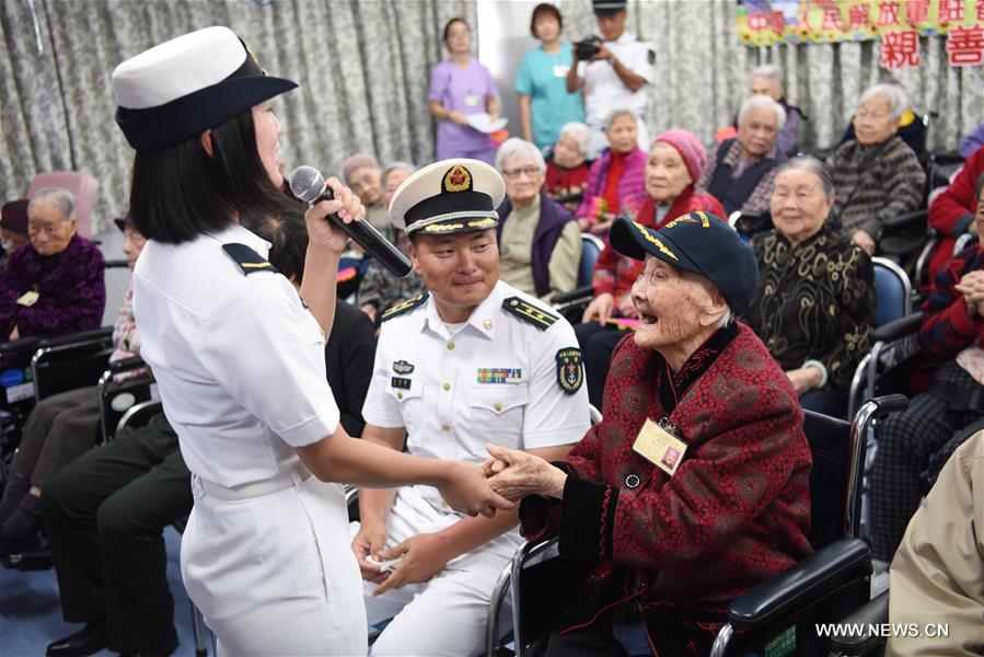 Soldiers, officers of aircraft carrier Liaoning visit elders in HK