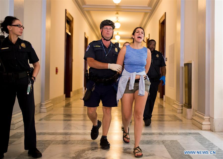 People protest against Republican health care bill in Washington D.C.