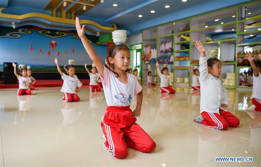 Students receive bilingual education in N China's Inner Mongolia