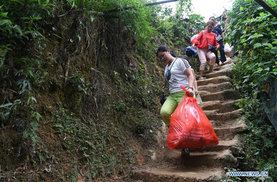 Heavy rain wreaks havoc in S China's Guangxi