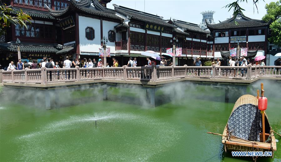 Mist cooling systems bring coolness to visitors in China's Shanghai