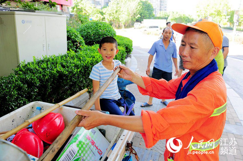 Boy spends special summer holiday with his grandpa, a sanitation worker