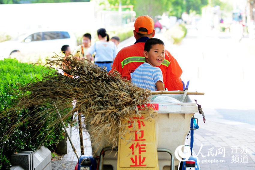 Boy spends special summer holiday with his grandpa, a sanitation worker