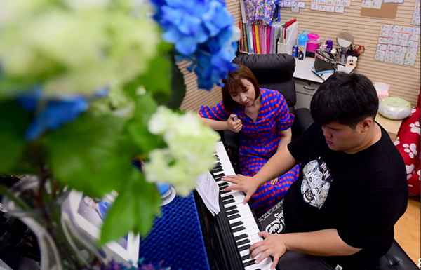 Disabled boy to play duet with Chinese top pianist Lang Lang