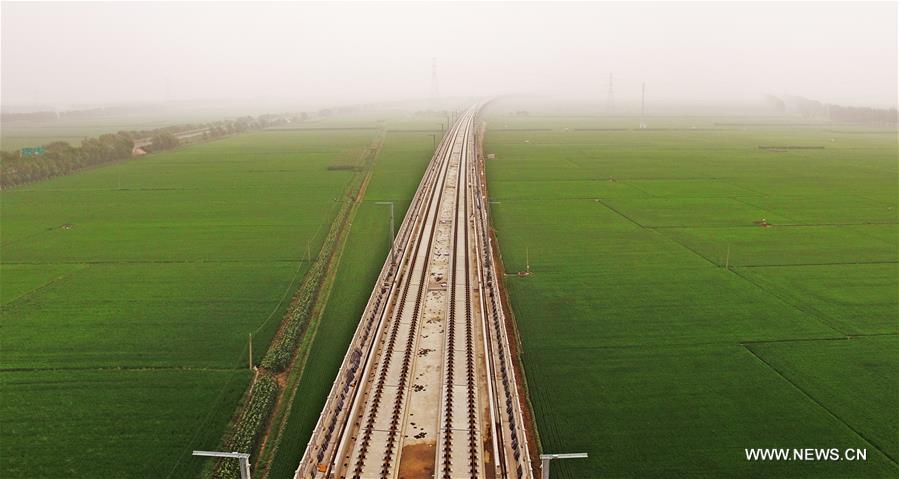 Photo taken on July 11, 2017 shows the construction site of Xinglongdian grand bridge in northeast China's Liaoning Province. The Beijing-Shenyang high-speed railway, linking China's capital Beijing and the Liaoning provincial capital Shenyang, is about 700 km long and is designed with a speed of 350 km per hour. Work on the Beijing-Shenyang railway project started in 2014. And it is expected to be completed by the end of 2018. (Xinhua/Yang Qing)