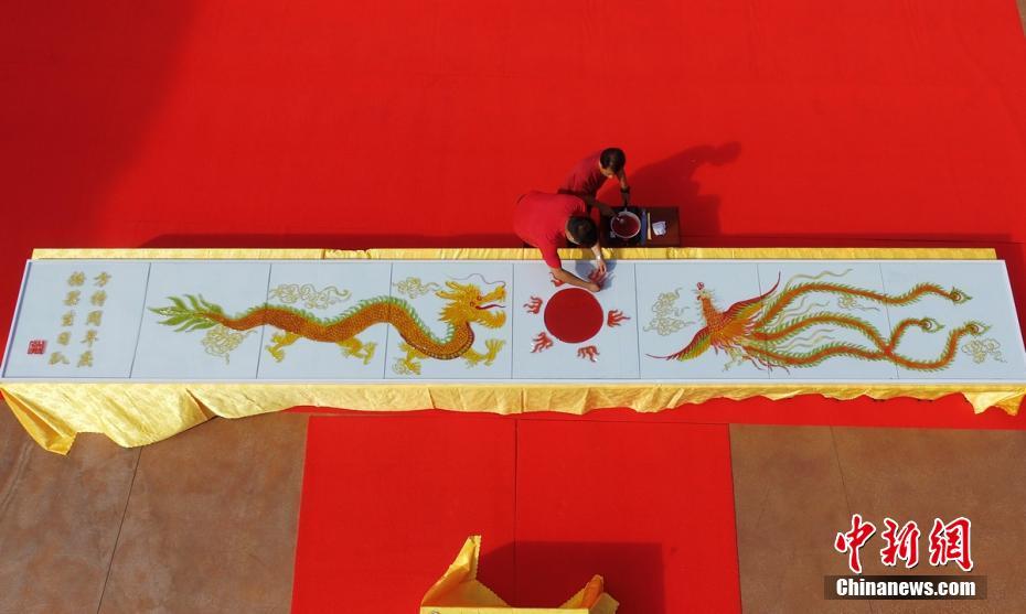 8.18-meter-long sugar painting produced in Hunan