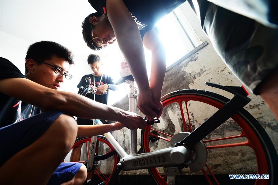 Dispatchers of shared bikes in China's Tianjin