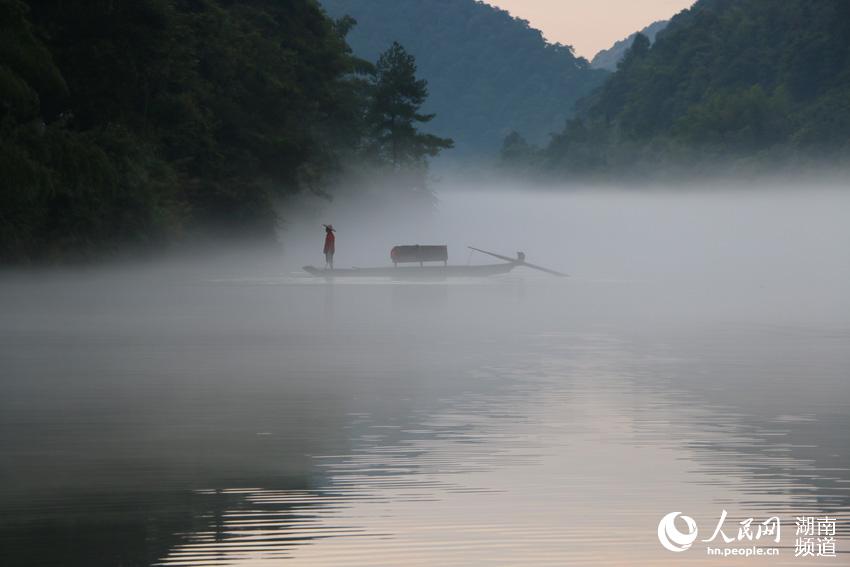 Dongjiang Lake cloaked by mist in Hunan