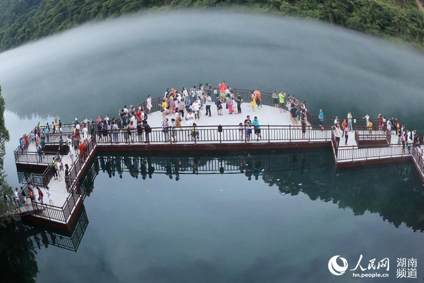 Dongjiang Lake cloaked by mist in Hunan