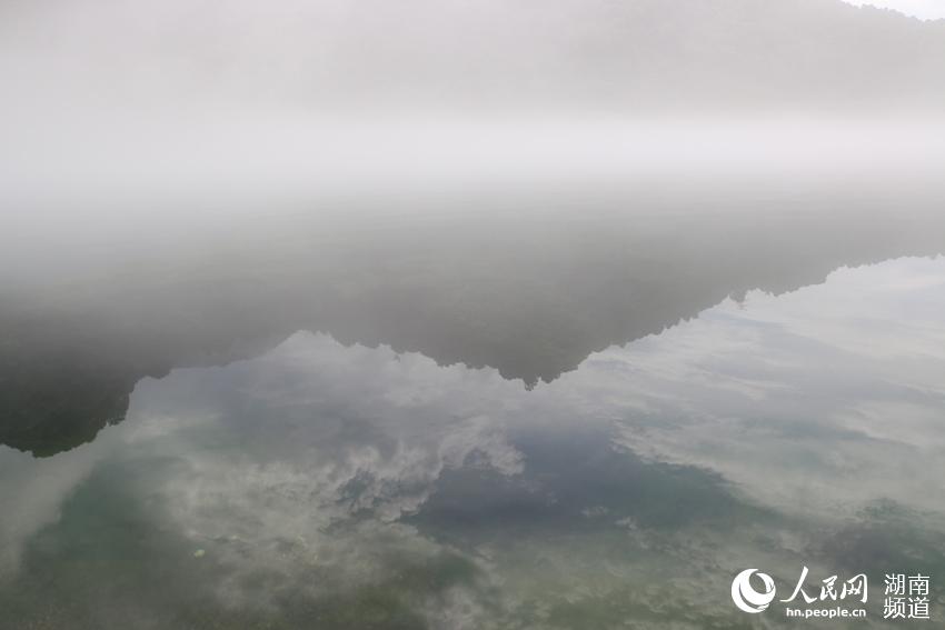 Dongjiang Lake cloaked by mist in Hunan