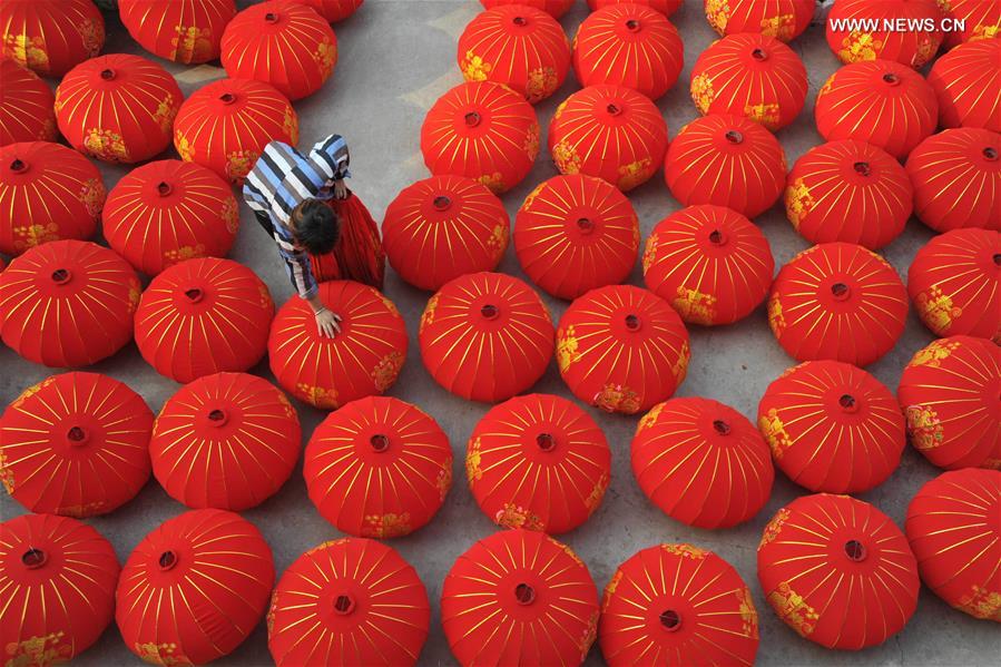 Red lanterns made for upcoming National Day and Mid-Autumn Festival holidays