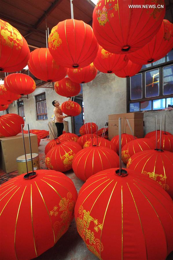 Red lanterns made for upcoming National Day and Mid-Autumn Festival holidays