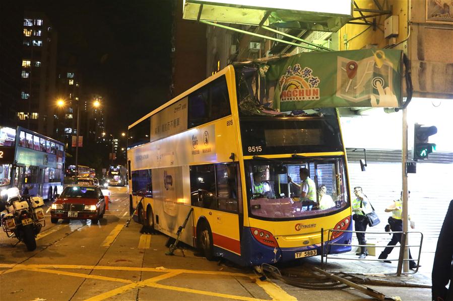 Three killed, 27 injured as bus mounts pavement in Hong Kong
