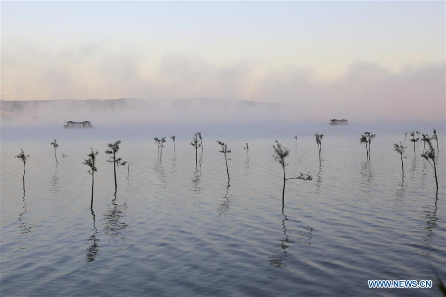 In pics: fog-enveloped Tianquan Lake in E China's Jiangsu