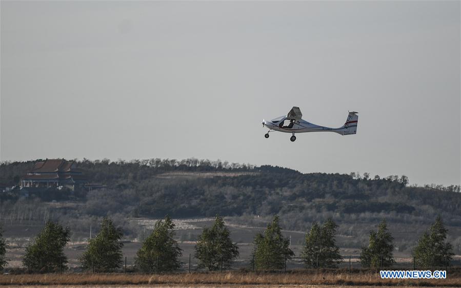 Advanced version of China's 1st electric plane makes maiden flight