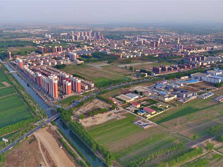 01           Xiongan New Area: city of Chinese dreams           Launching of the new area is expected to help phase out some non-capital functions from Beijing, explore a new model of optimized development in densely-populated areas, and restructure the urban layout in the Beijing-Tianjin-Hebei region,The new area will cover around 100 square km initially and be expanded to 200 square km in the mid-term and about 2,000 square km in the long term.         
