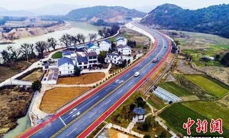 Ribbon-like colored highway opens to traffic