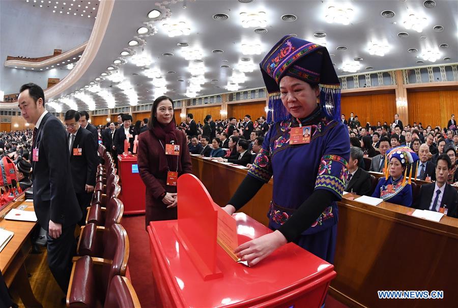 China's national legislature adopts constitutional amendment