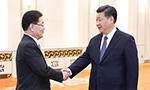 Xi meets South Korean official, vows to push for political solution