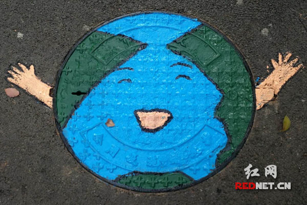 Manhole cover graffiti art themed environmental protection in Changsha