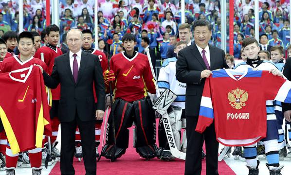 Xi, Putin watch ice hockey match