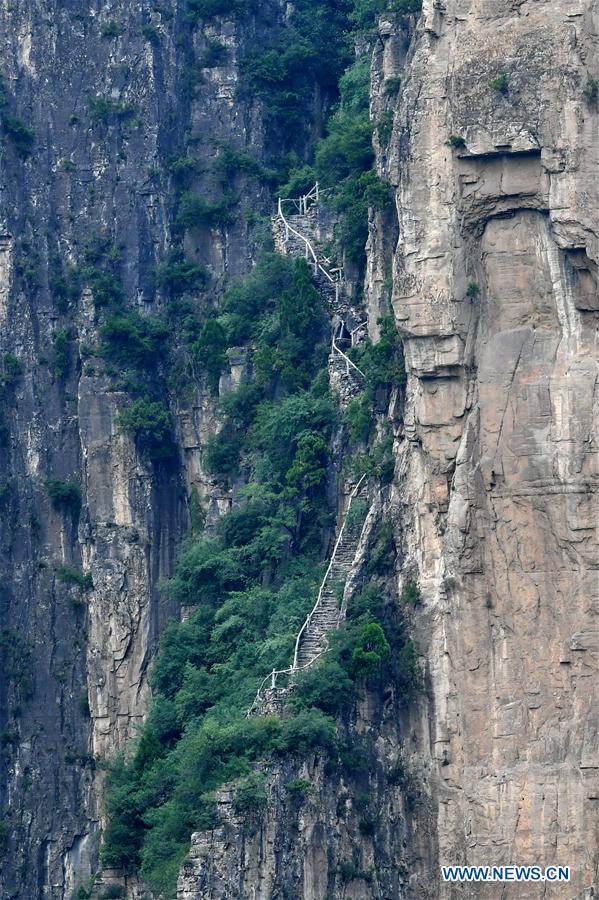 Cliff road helps villagers cast off poverty in N China's Shanxi