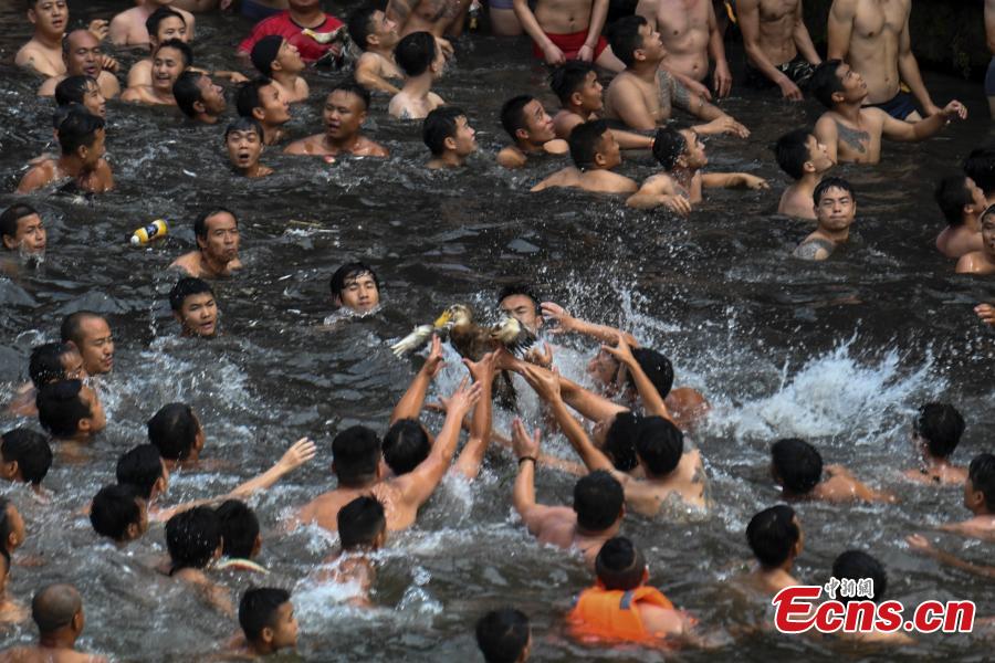 Duck-grabbing tradition in ancient town