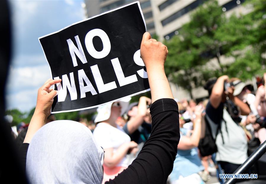 People protest against Trump's immigration policies in Washington D.C.
