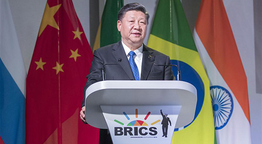 Xi says China firmly supports free trade