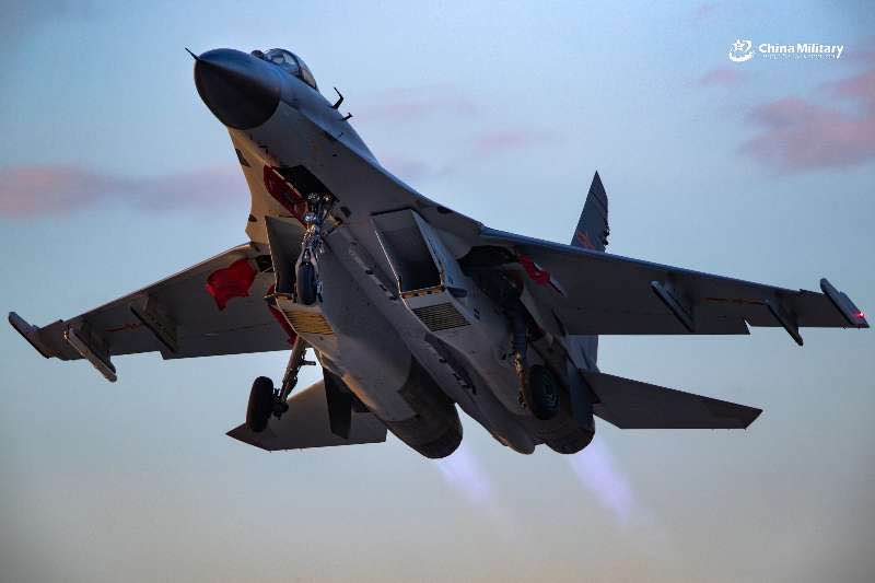 J-11B fighter jet conducts tactical maneuver