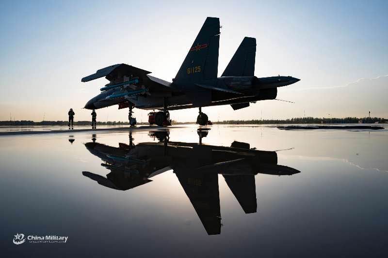 J-11B fighter jet conducts tactical maneuver