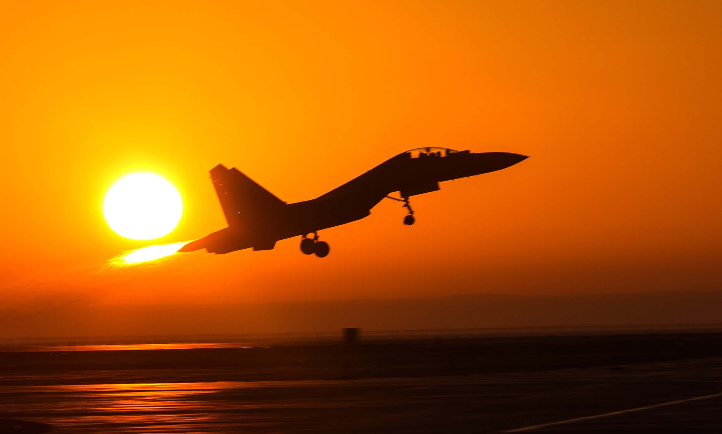 Fighter jets take off for air combat training