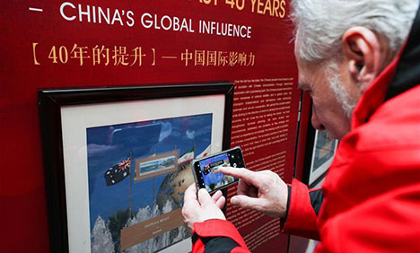 Stamp exhibition marks 40th anniv.of reform, opening up