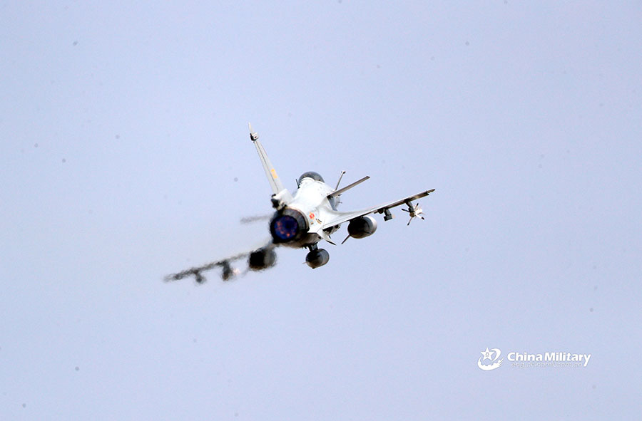 J-10 fighter jet dives to assault mock targets