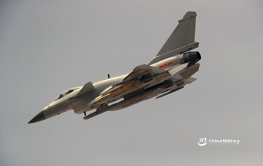 J-10 fighter jet dives to assault mock targets