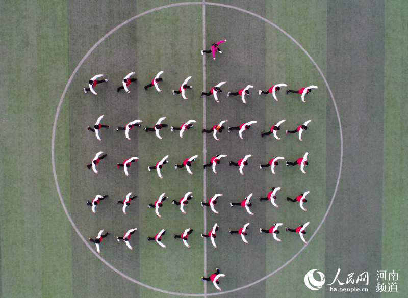 Students play Taiji between classes in Henan