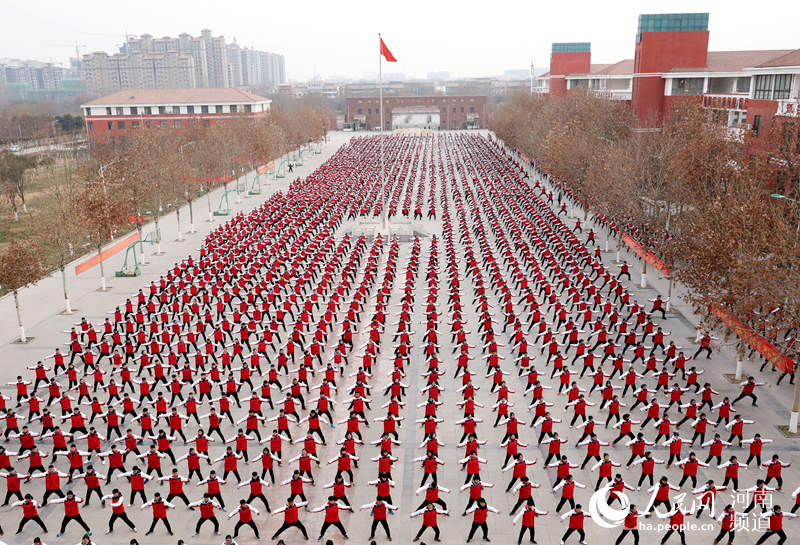 Students play Taiji between classes in Henan