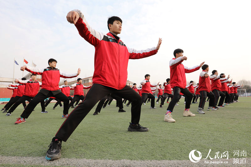 Students play Taiji between classes in Henan