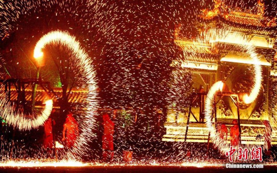 Molten iron fireworks show greets Chinese New Year